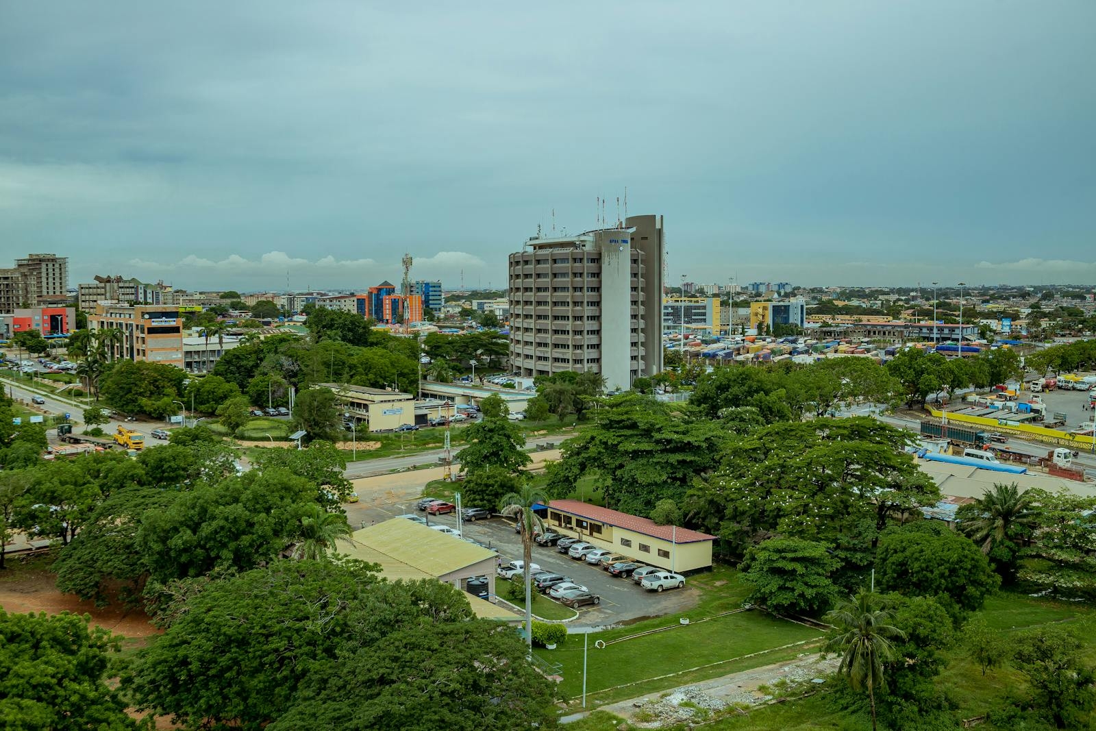 A scenic aerial shot of Tema cityscape in Ghana showcasing buildings and greenery.