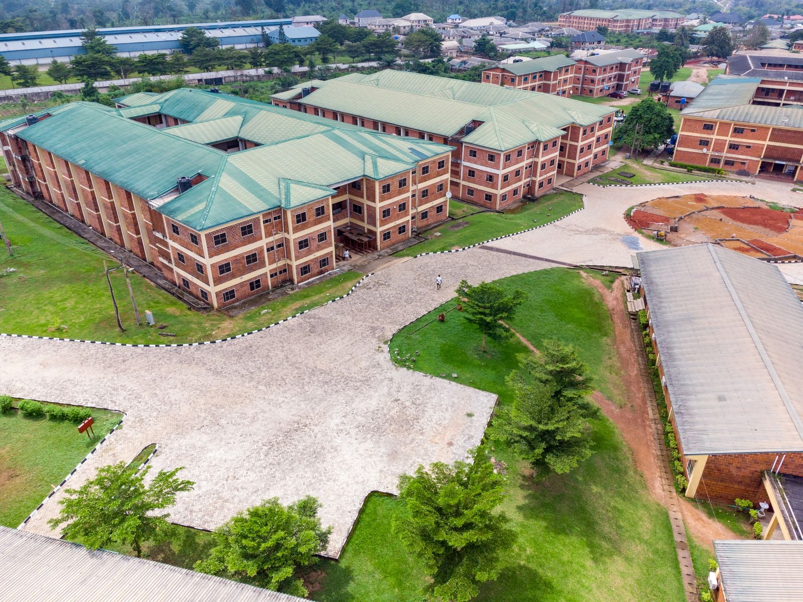 Aerial shot of a university campus in Ota, Nigeria, showcasing modern educational architecture.