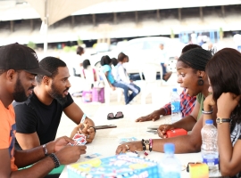 people sitting beside table